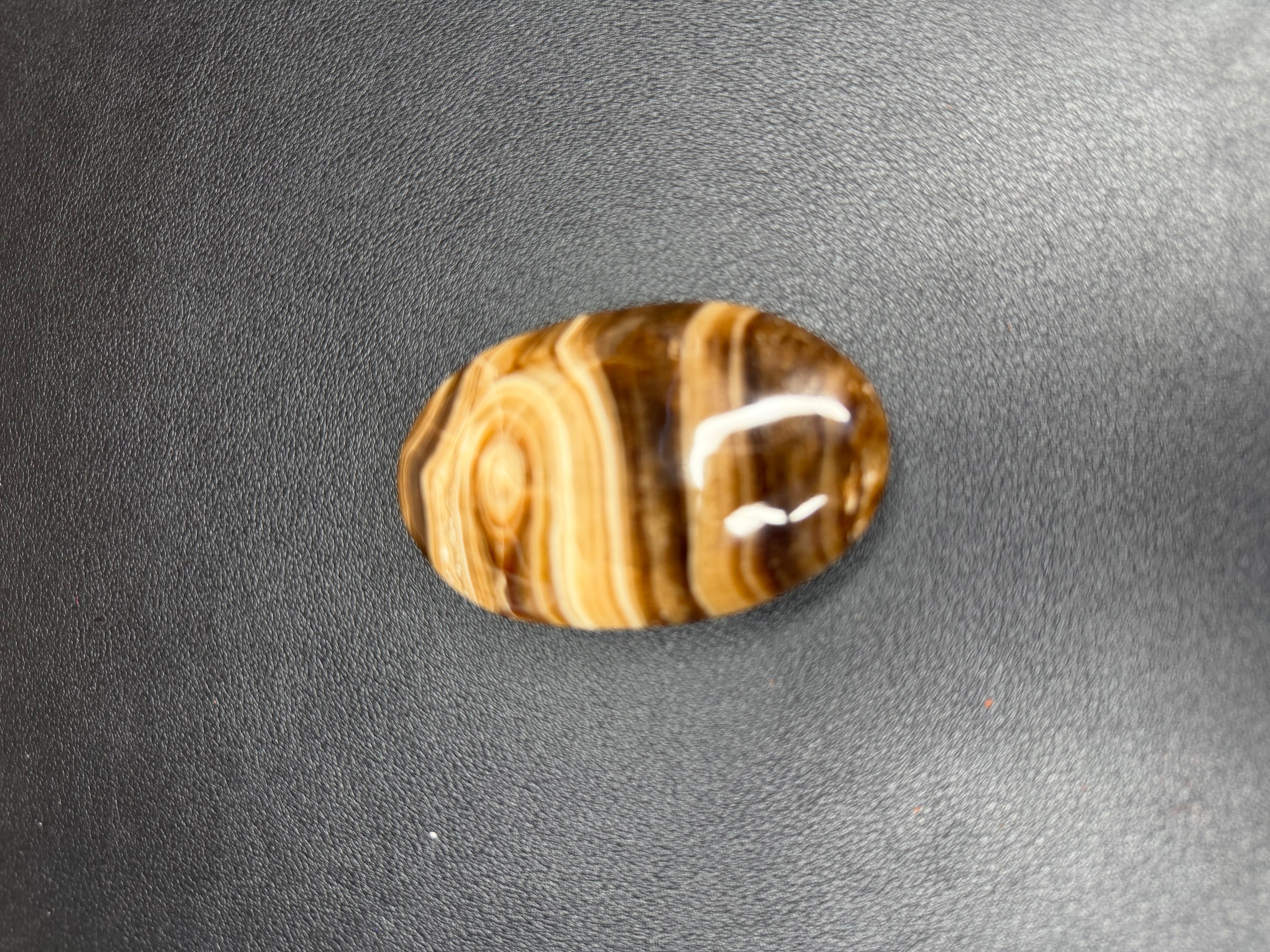 Chocolate calcite palm stone