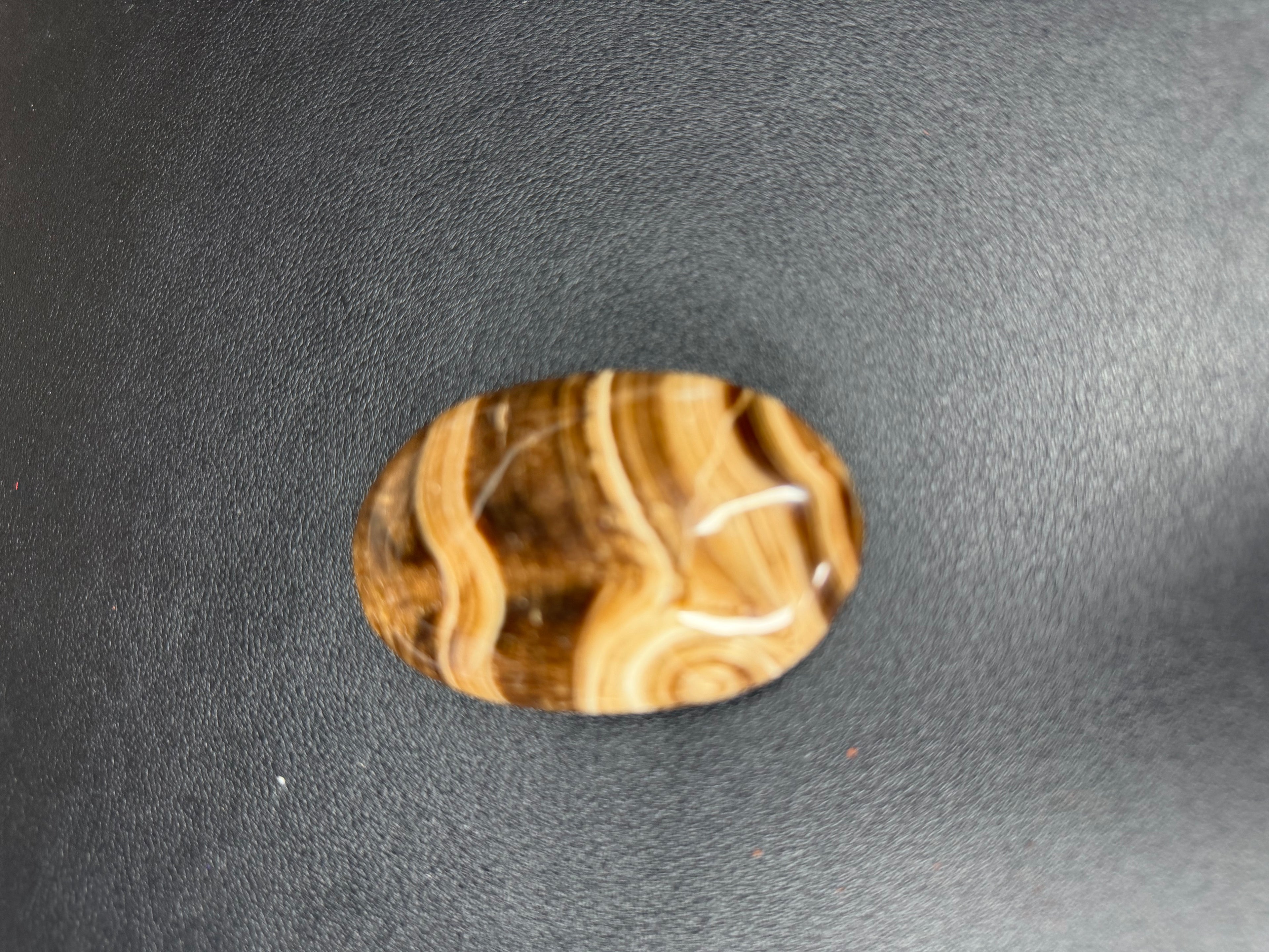Chocolate calcite palm stone