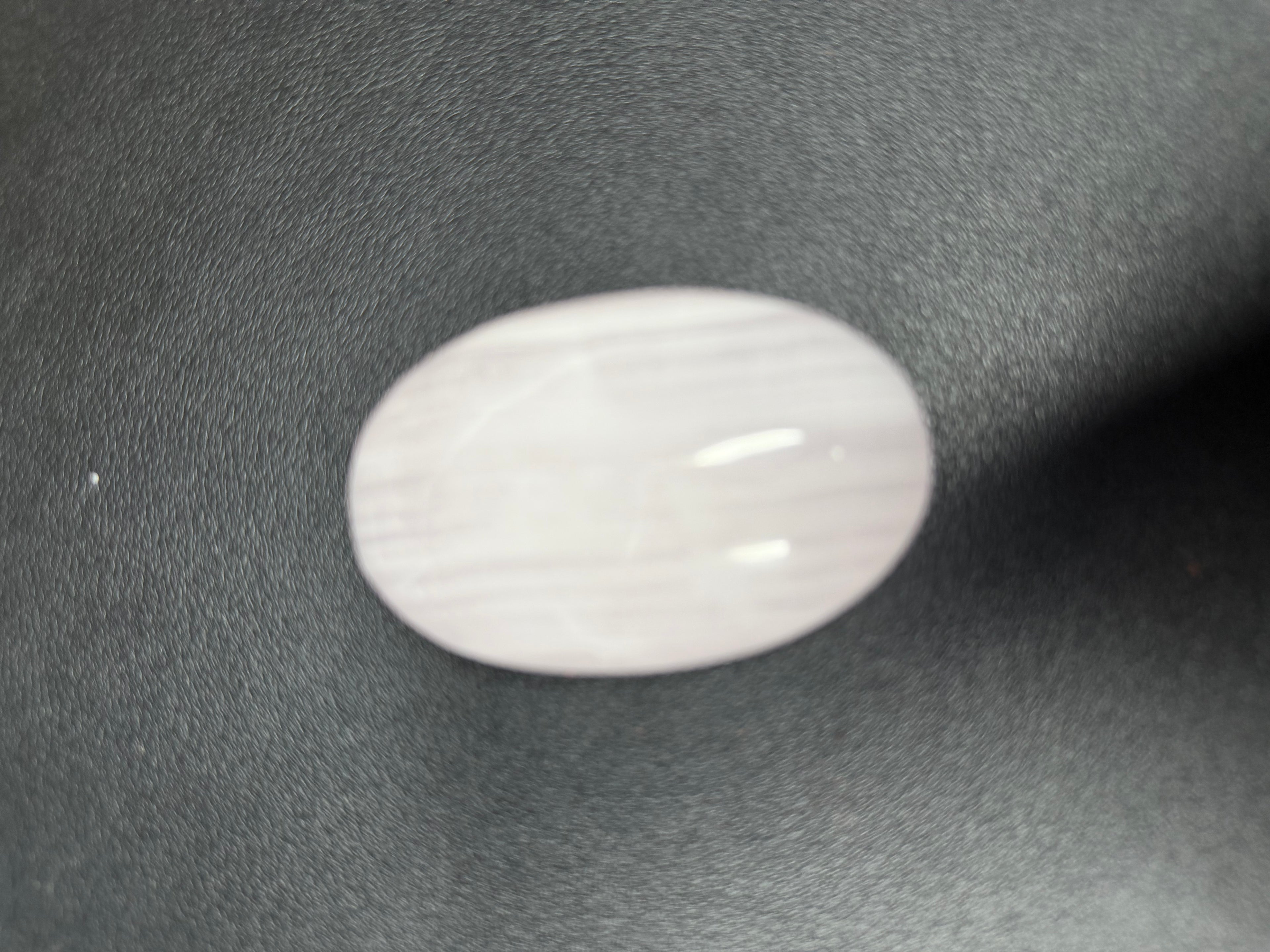 Pink mangano calcite palm stone