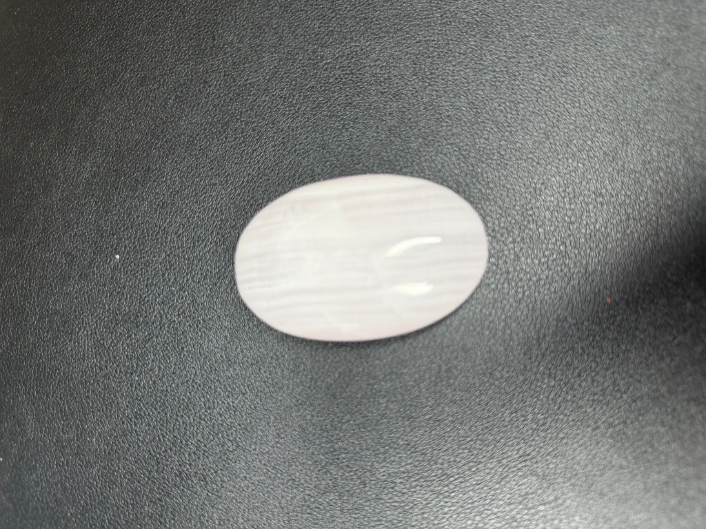 Pink mangano calcite palm stone