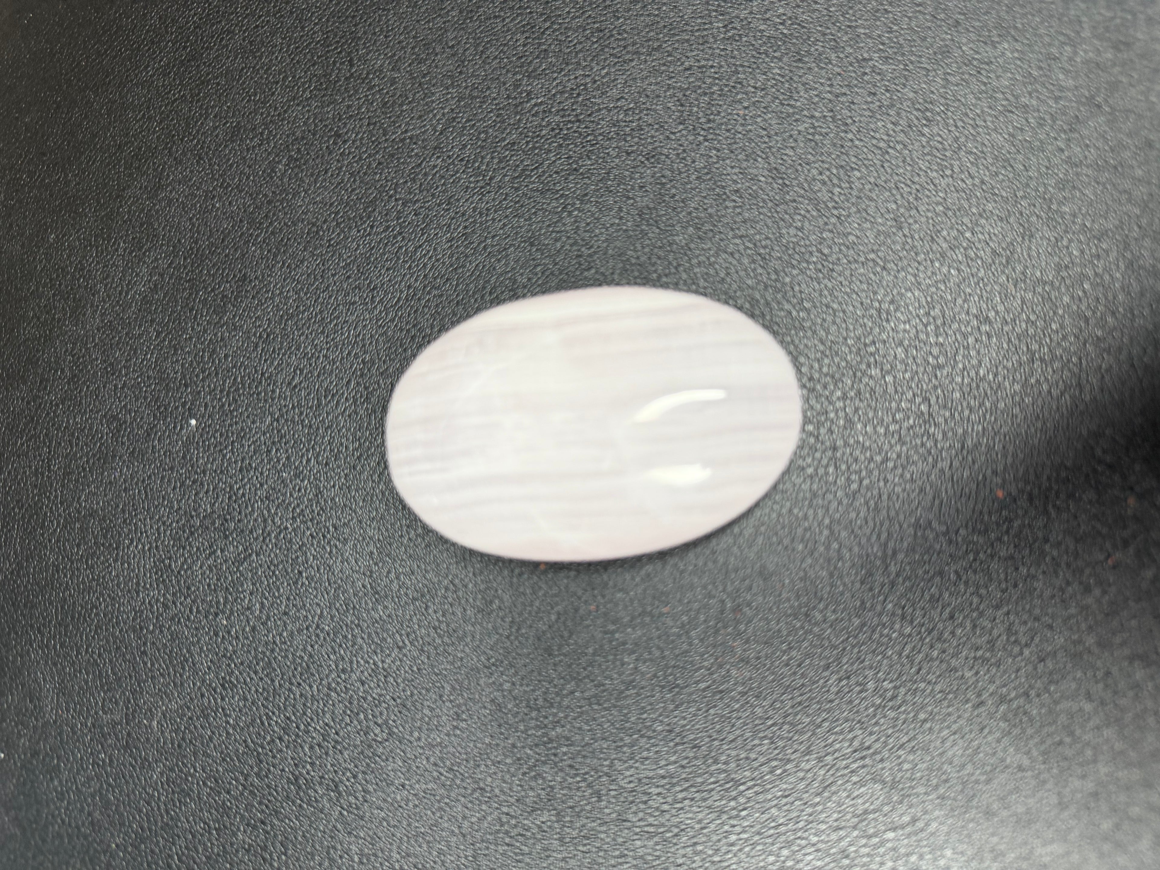 Pink mangano calcite palm stone