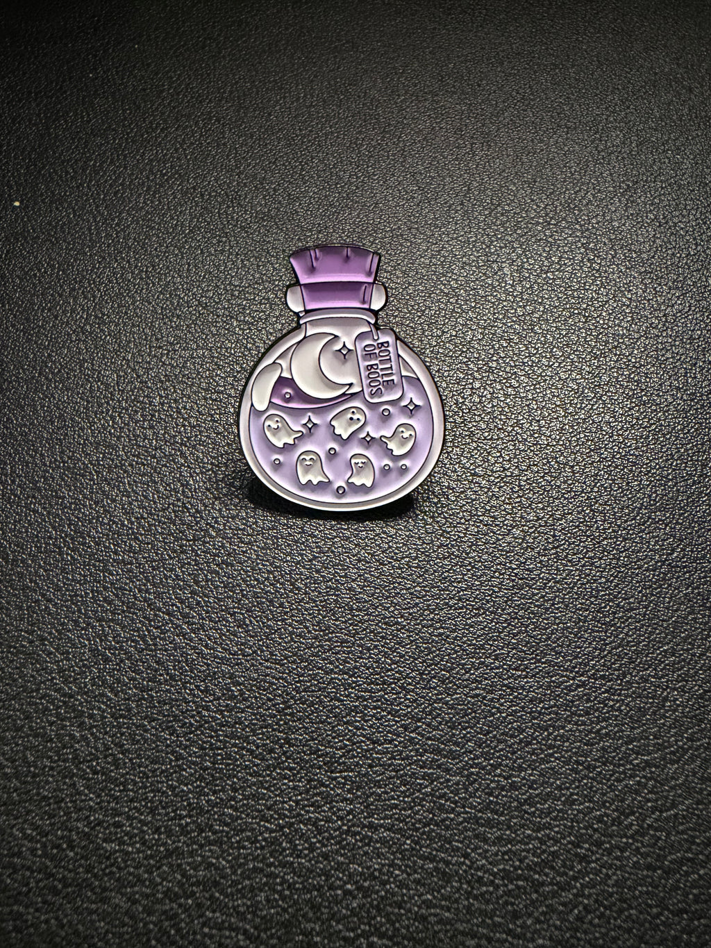 bottle of boos pin