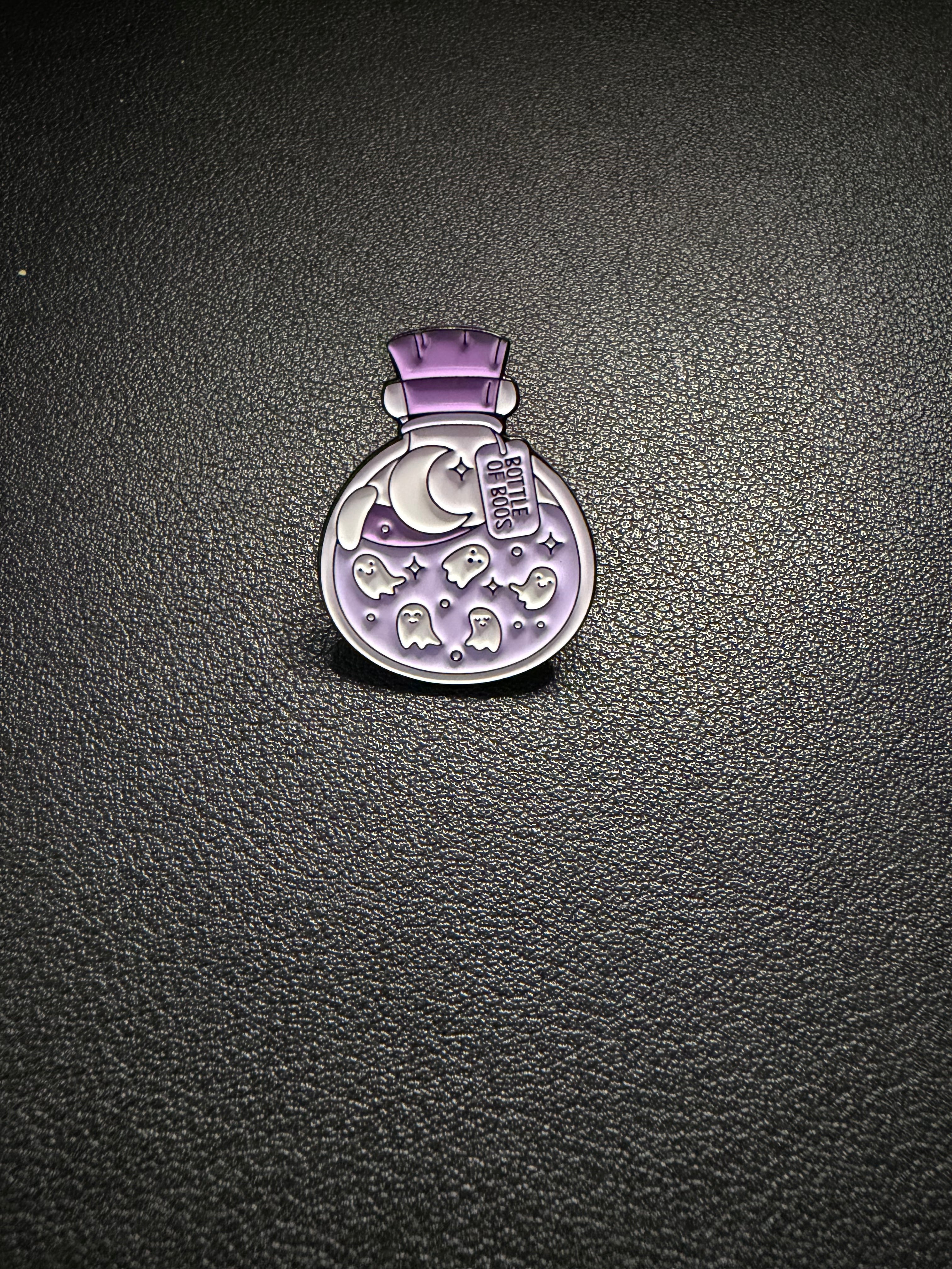 bottle of boos pin